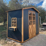 “Antrasit gövdeli, doğal ahşap kapılı ve pencereli 3 m² Belma Bahçe Kulübesi dış mekân görünümü.”